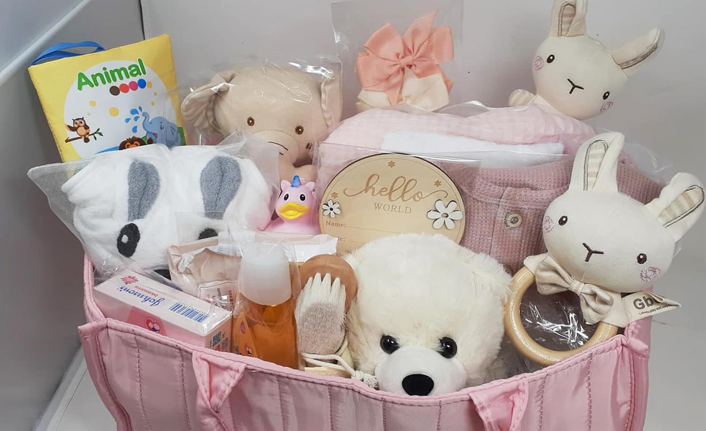 Premium New Baby Girl Gift Basket Newborn Essentials Care Package in Diaper Caddy Organizer Elephant Plush Toy, Baby Clothes, Bath Set, Hooded Towel, Rattle, Keepsakes & More Pink & White
