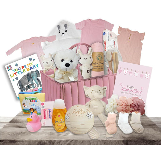 Premium New Baby Girl Gift Basket  Newborn Essentials Care Package in Diaper Caddy Organizer  Elephant Plush Toy, Baby Clothes, Bath Set, Hooded Towel, Rattle, Keepsakes & More Pink & White